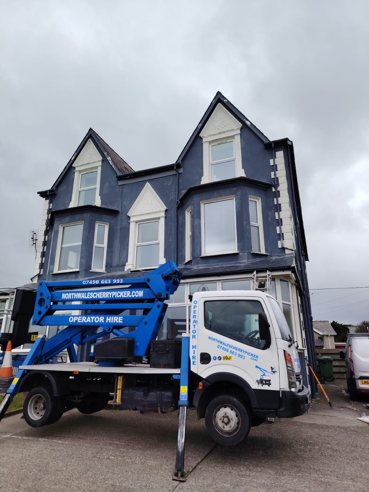 External Painting in Progress Cherry Picker Access